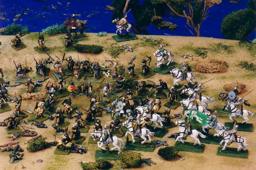 Uruk-hai and Rohirrim infantry and cavalry war-gaming miniatures